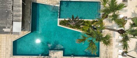 2 outdoor pools, pool umbrellas, pool loungers