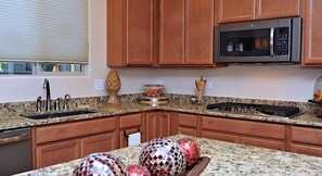 Condo, 3 Bedrooms | Private kitchen | Fridge, microwave, coffee/tea maker