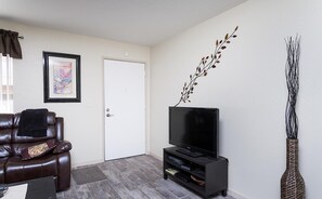 Condo, 1 habitación | Área de sala de estar | Reproductor de DVD