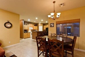 Condo, 4 Bedrooms, Pool View | In-room dining - Cactus Bloom By Signature Vacation Rentals (Goodyear)