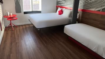 Premium bedding, blackout curtains, iron/ironing board, free WiFi