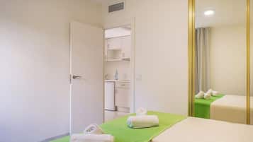 Apartamento familiar | Caja fuerte, wifi gratis, ropa de cama