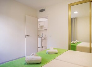 Familie appartement | Een kluis op de kamer, gratis wifi, beddengoed
