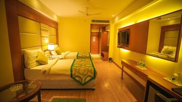 Habitación Deluxe | Ropa de cama de alta calidad y minibar