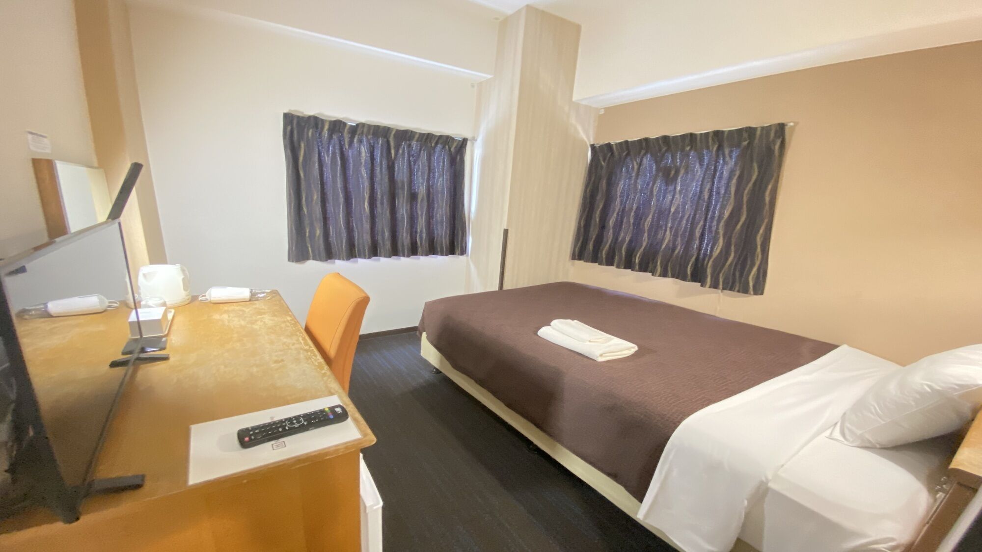Desk, blackout curtains, free WiFi, bed sheets