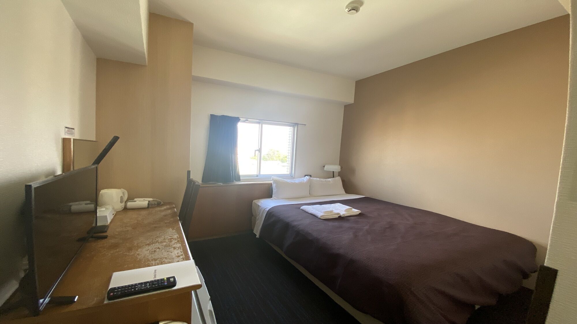Desk, blackout curtains, free WiFi, bed sheets