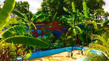 Explore the lush surroundings and enjoy the play area with a slide and swings.