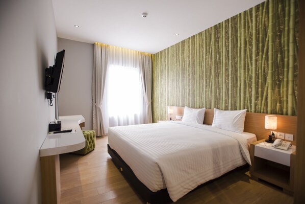 Deluxe-Zimmer | Minibar, Zimmersafe, Schreibtisch, Bügeleisen/Bügelbrett