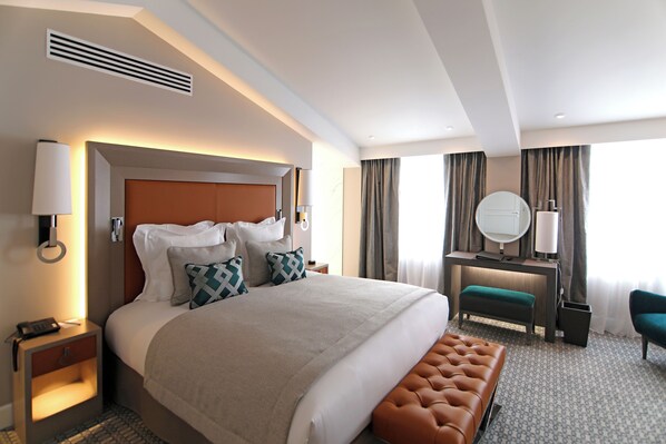 Ropa de cama de alta calidad y minibar con artículos gratuitos