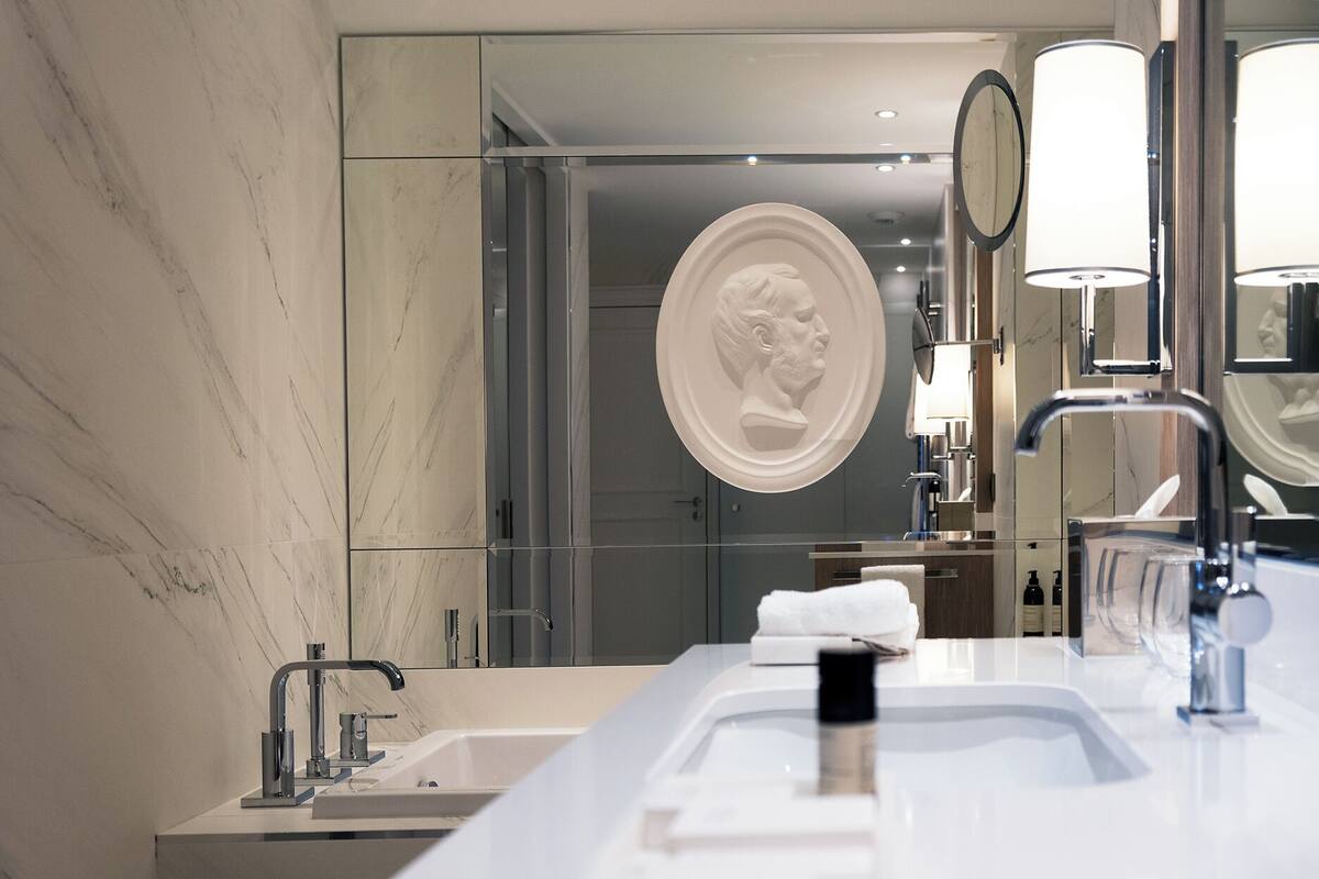 deluxe double room | bathroom | designer toiletries, hair dryer, bathrobes, slippers