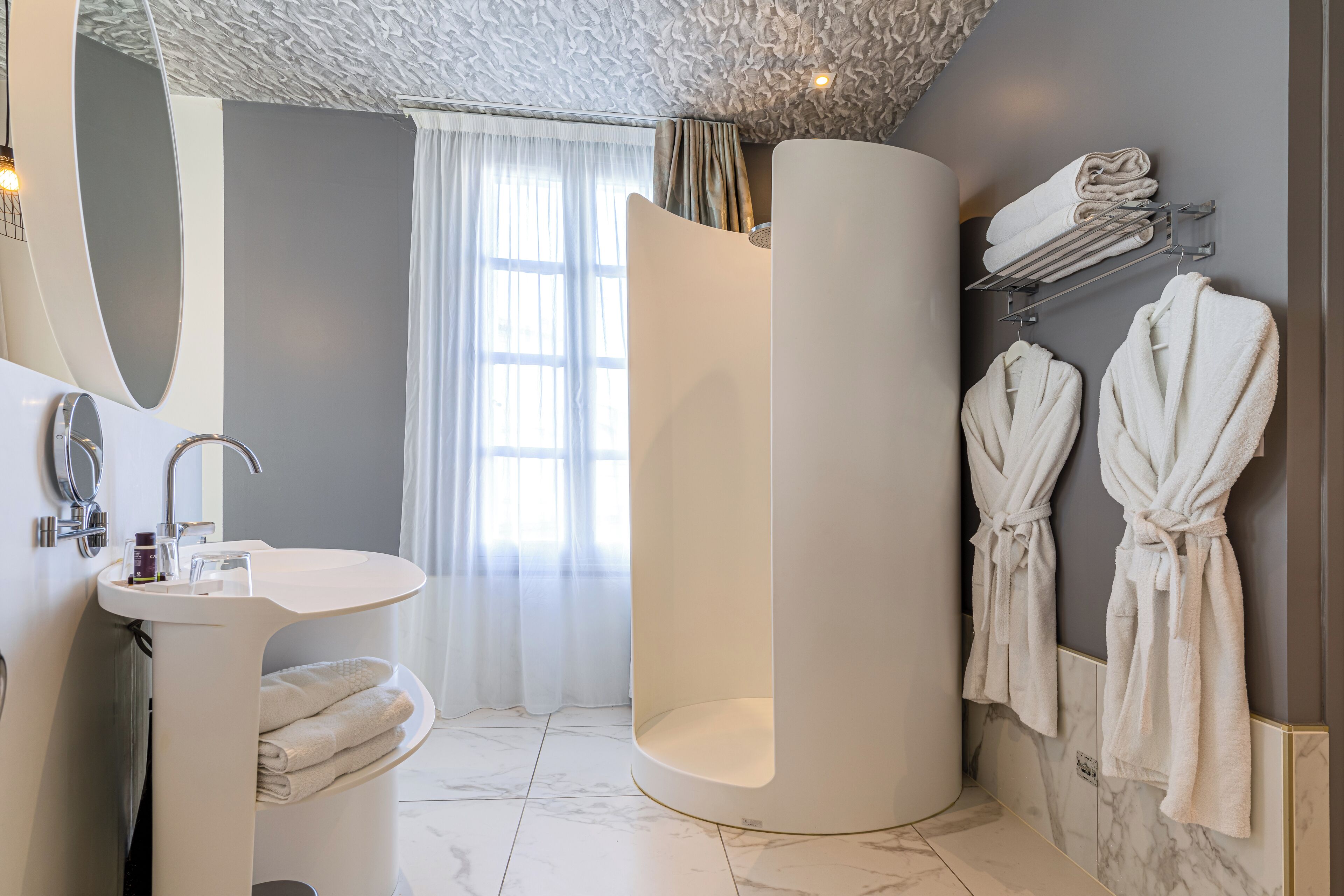 family suite | bathroom | free toiletries, hair dryer, bathrobes, slippers