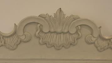 A detailed architectural molding with a symmetrical design.