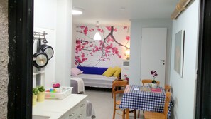 Family Suite, 2 Bedrooms, Non Smoking, Kitchen | Living area | Flat-screen TV