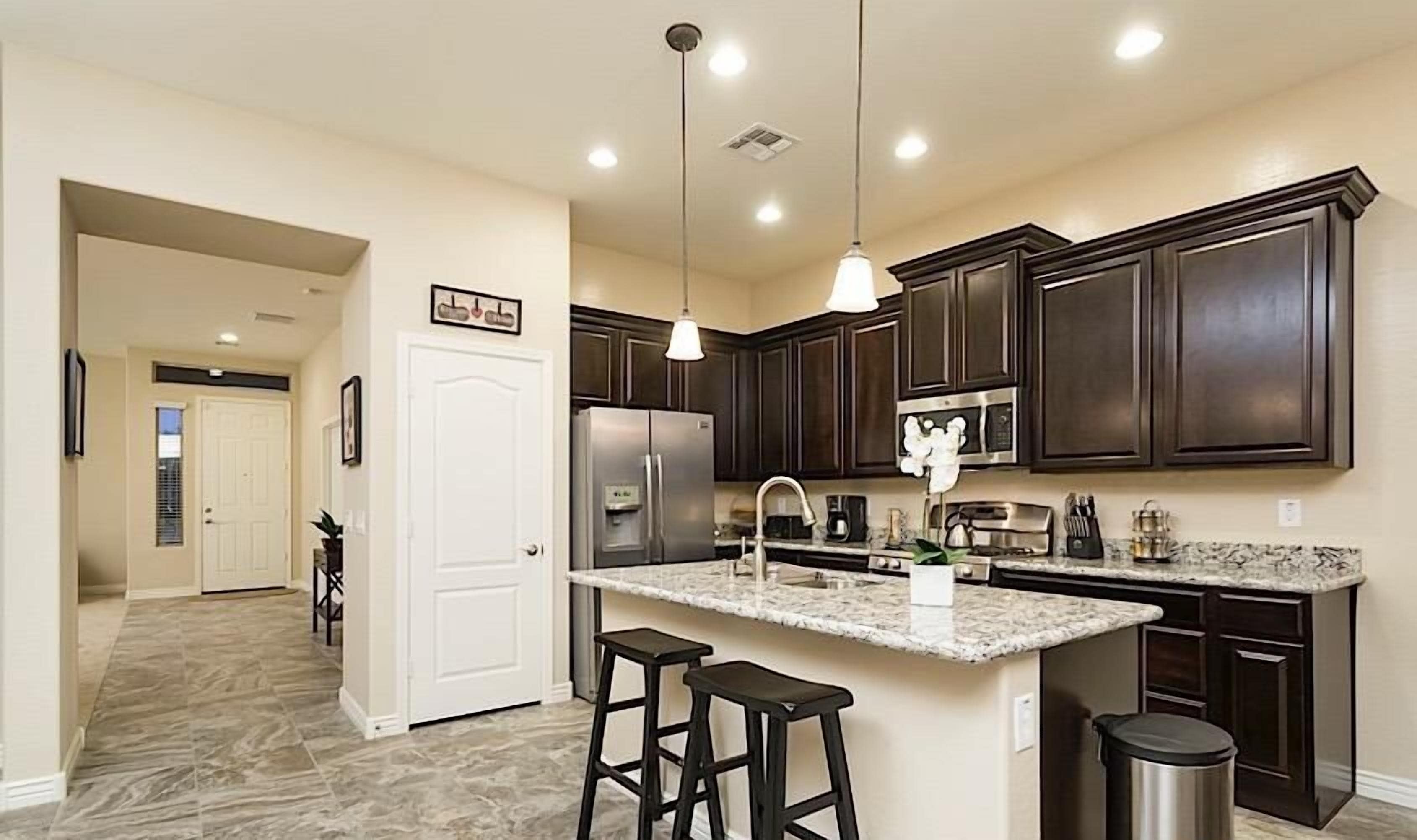 Condo, 4 Bedrooms | Private kitchen | Fridge, microwave, coffee/tea maker