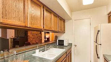 Condo, 2 Bedrooms | Private kitchen | Fridge, microwave, coffee/tea maker