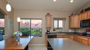 Condo, 4 Bedrooms | Private kitchen | Fridge, microwave, coffee/tea maker