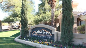 A sign for Bella Terra Condominiums at Paradise Valley. - Paradise Found By Signature Vacation Rentals (Scottsdale)