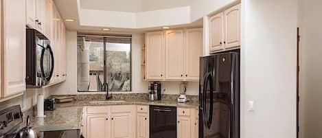 Condo, 2 Bedrooms | Private kitchen | Fridge, microwave, coffee/tea maker