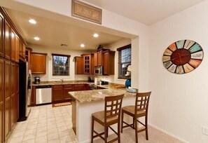 Condo, 3 Bedrooms | Private kitchen | Fridge, microwave, oven, stovetop