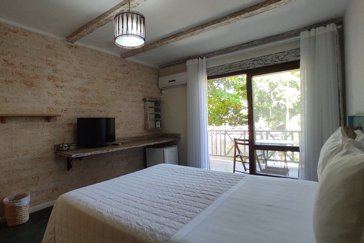Quarto casal standard | Frigobar, cortinas blackout, Wi-Fi de cortesia, roupa de cama