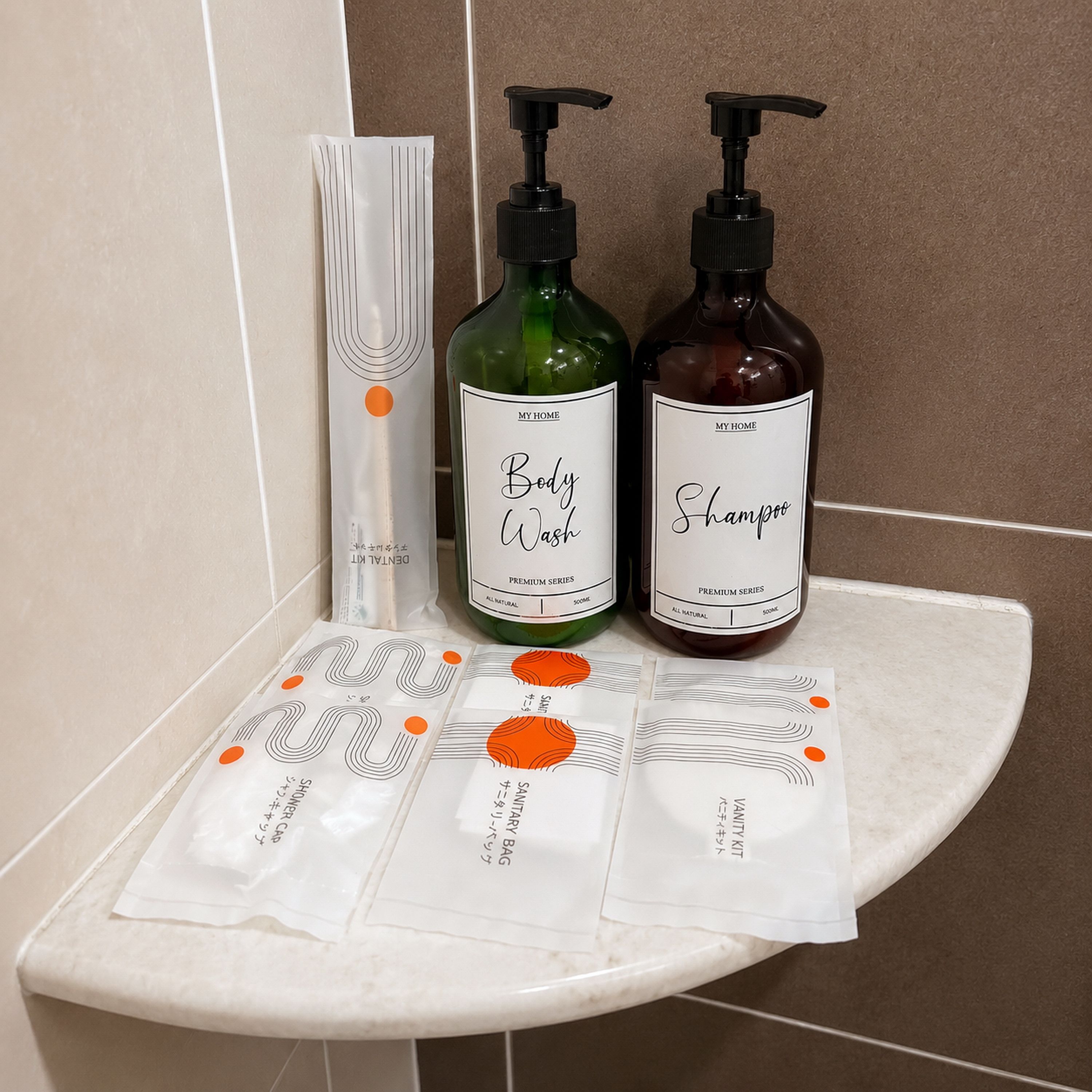 A bathroom shelf with two bottles of body wash and shampoo, a towel, and a shower cap.