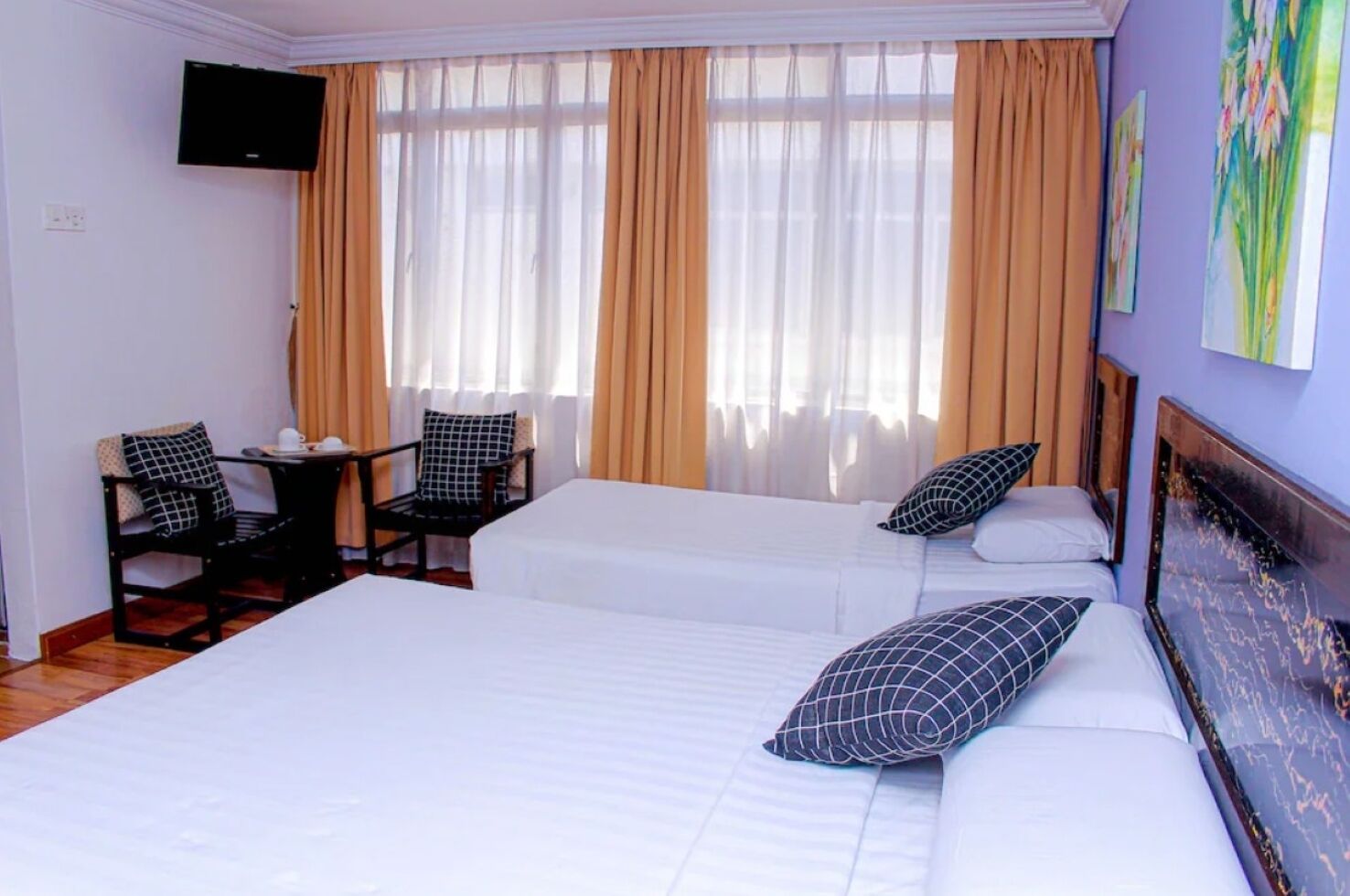 Premium bedding, desk, laptop workspace, iron/ironing board