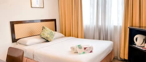 Habitación ejecutiva con 1 cama matrimonial o 2 individuales | Sábanas de algodón egipcio, ropa de cama de alta calidad y edredón