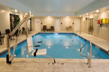 Indoor pool, open 10:00 AM to 10:00 PM, pool loungers