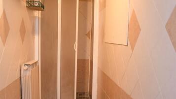 Deluxe Room, Private Bathroom | Bathroom | Shower, rainfall showerhead, free toiletries, hair dryer