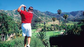 Golfers can enjoy a round on our well-maintained course with scenic views of rolling hills and lush vegetation.