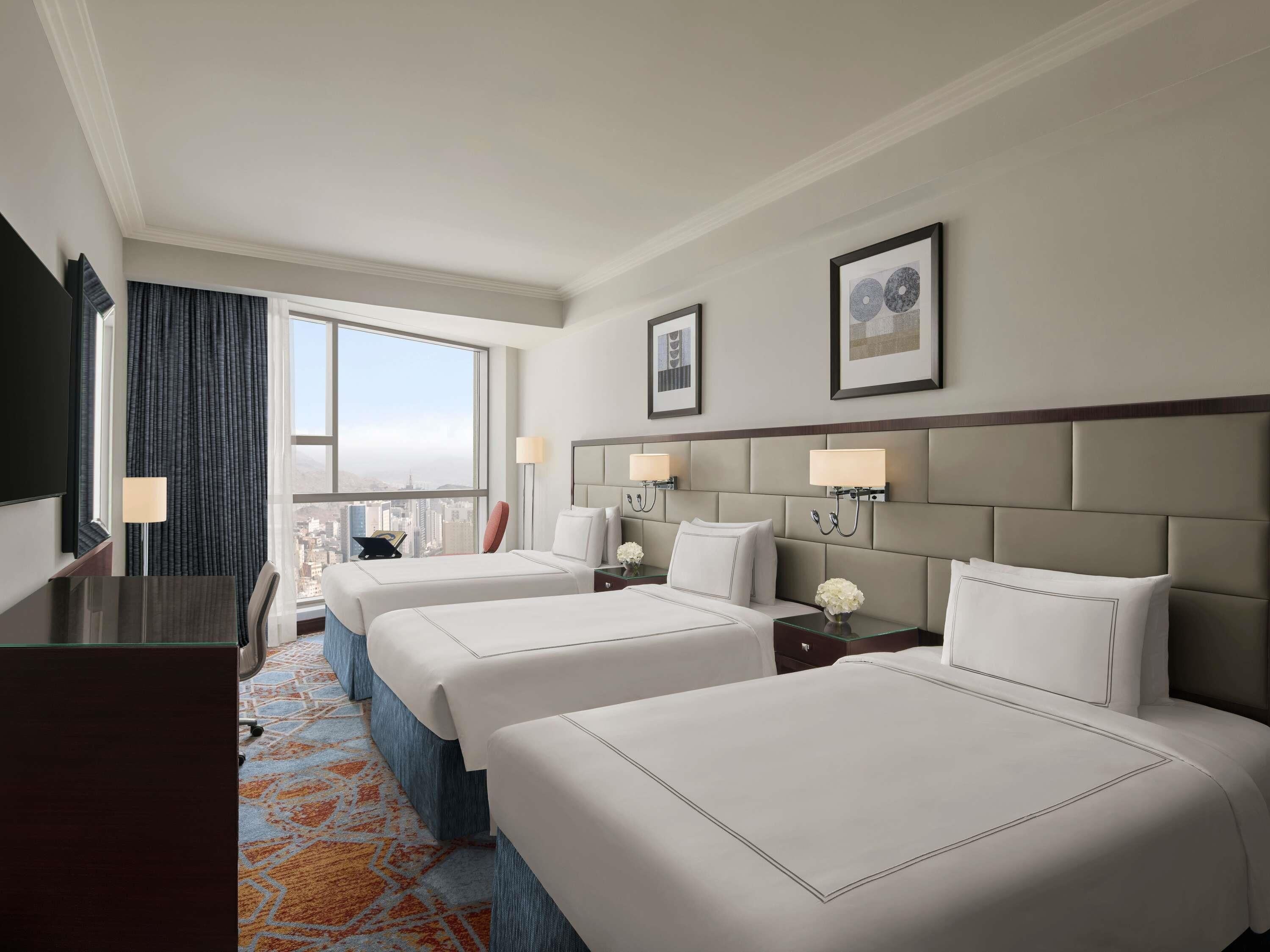 Premium bedding, memory-foam beds, in-room safe, desk