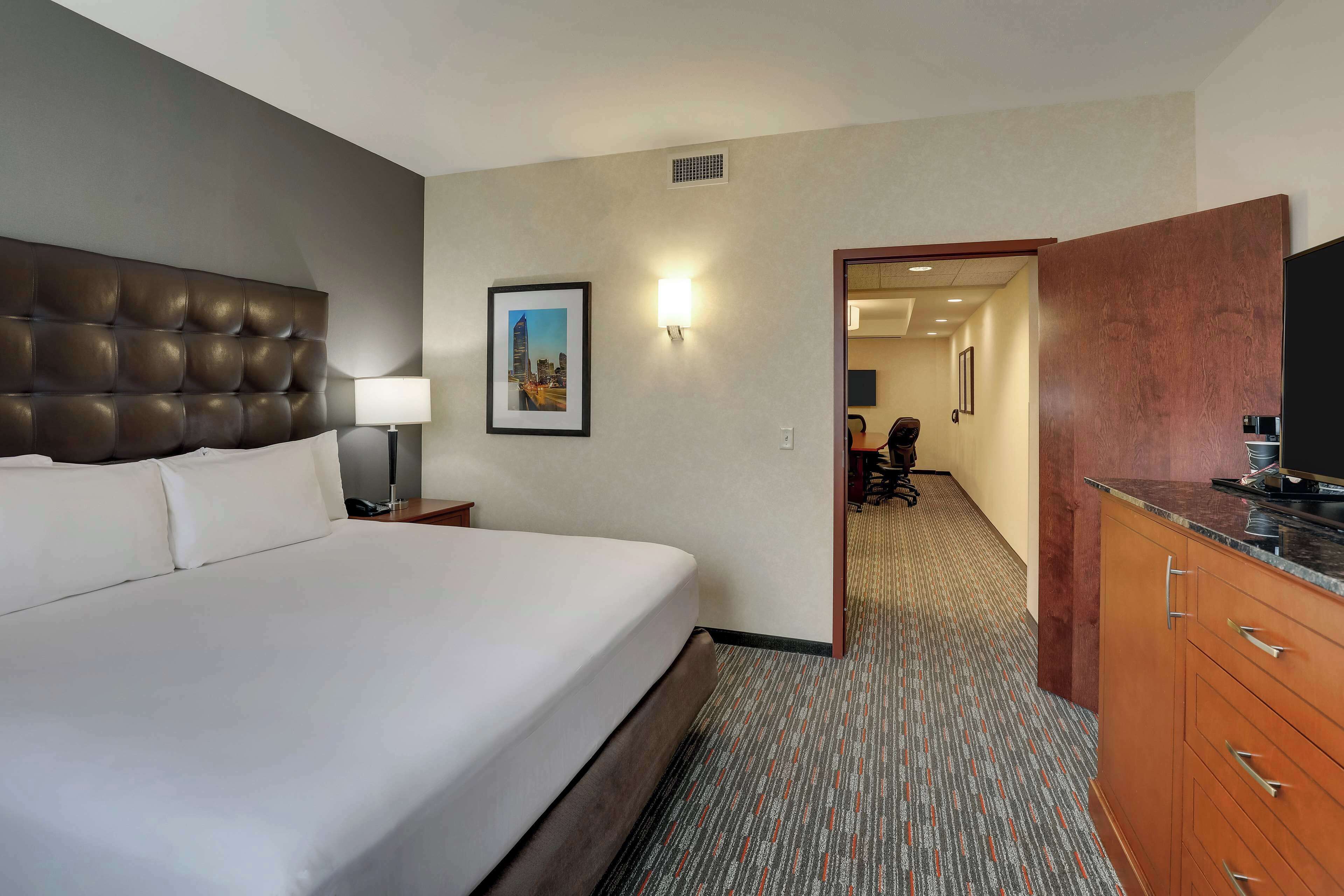 suite, 1 king bed, accessible, refrigerator & microwave (2 room, board room table,hearing,tub) | 1 bedroom, desk, laptop workspace, blackout curtains