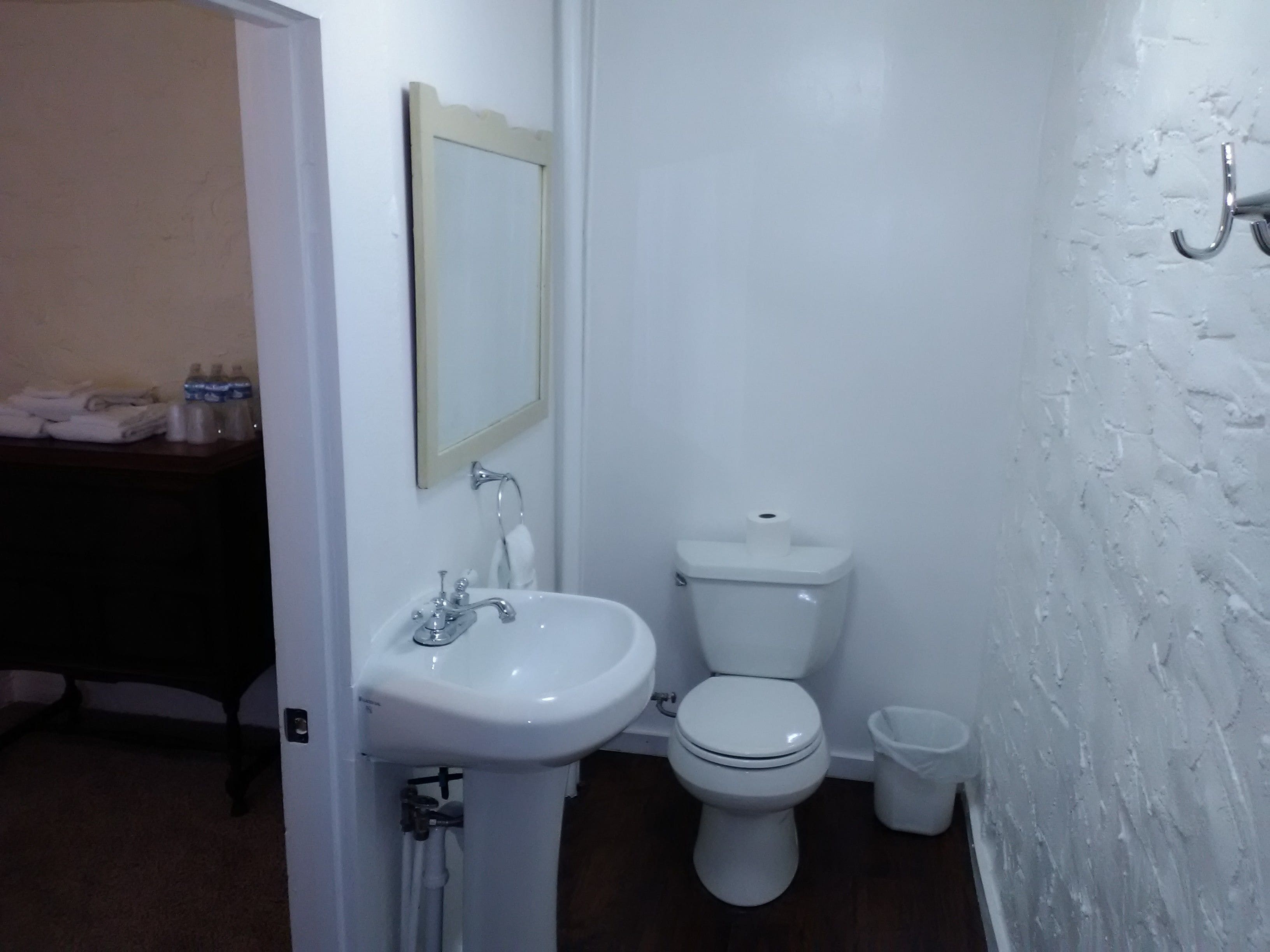 family suite, multiple beds, refrigerator & microwave, courtyard area | bathroom | hydromassage showerhead, free toiletries, towels, soap