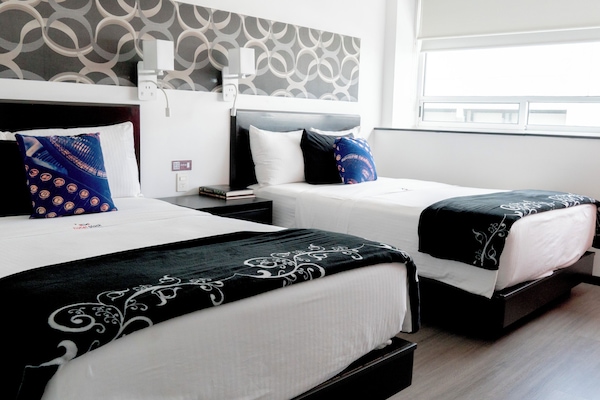 Executive kamer, 2 tweepersoonsbedden | Luxe beddengoed, donzen dekbedden, bedden met traagschuimmatras