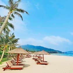 On the beach, sun-loungers, beach umbrellas, beach towels
