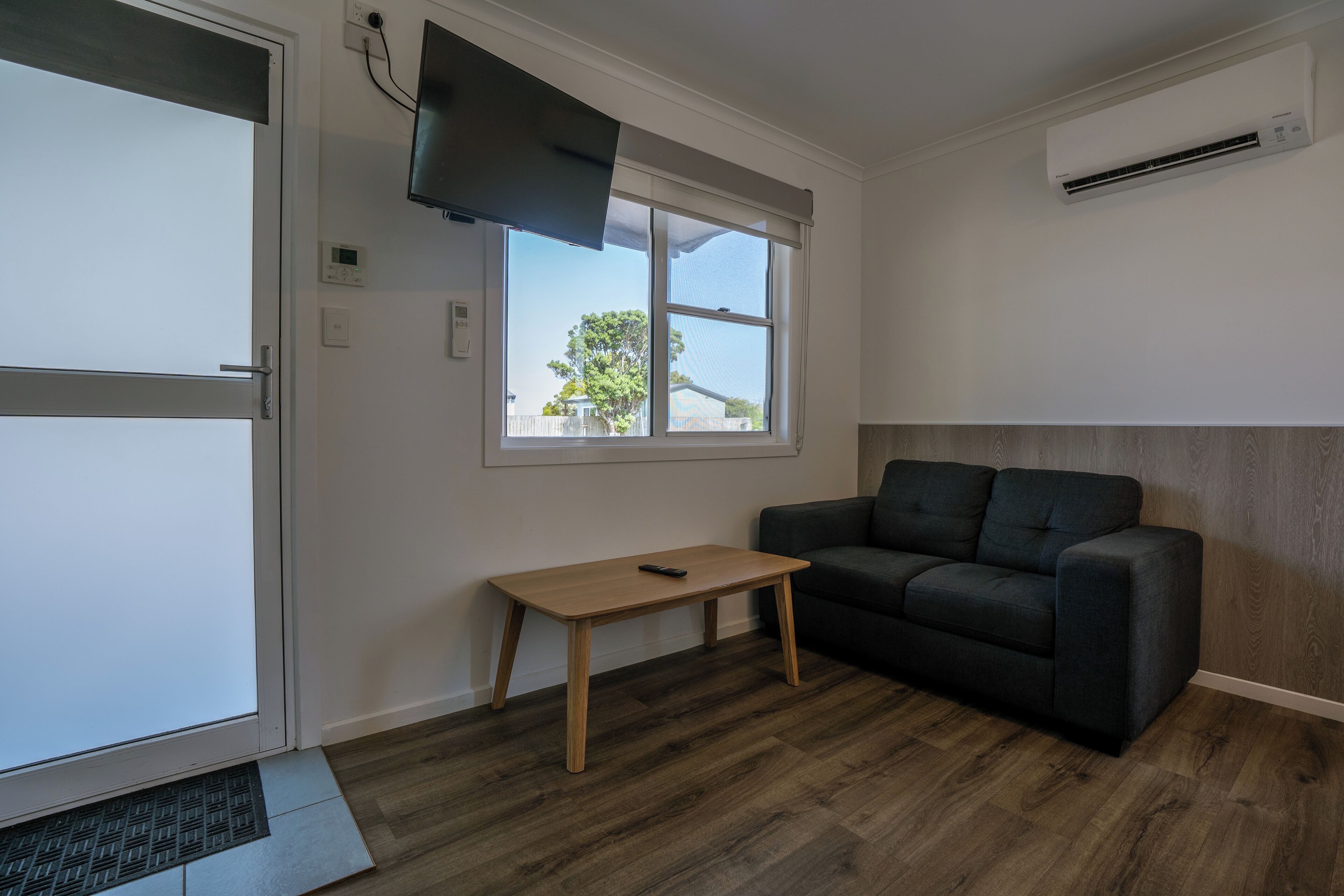 Chambre Double, 1 grand lit | Coin séjour