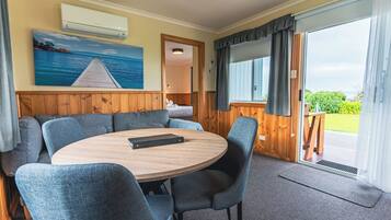 Waterfront Spa | Living area | 50-cm flat-screen TV with digital channels, TV