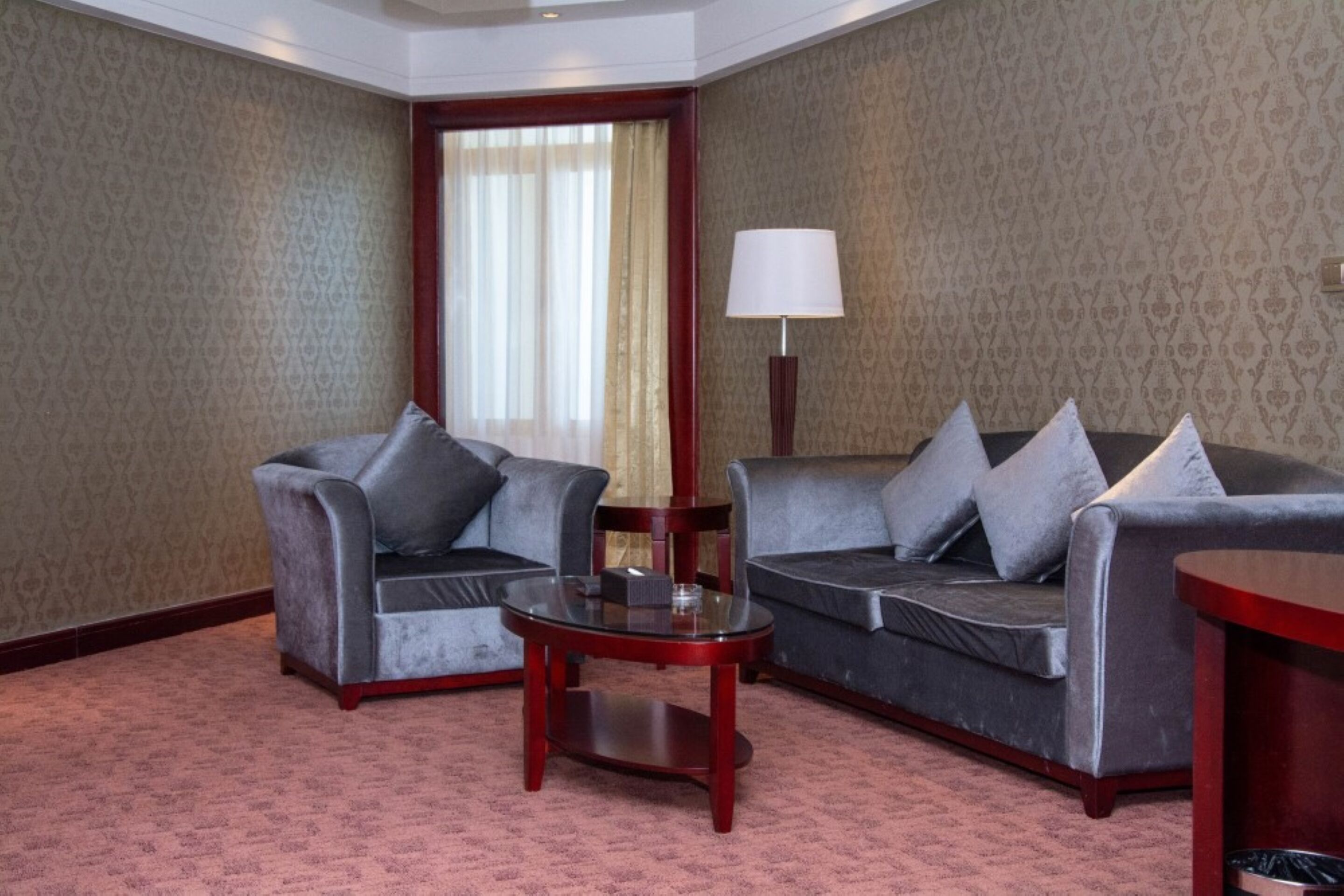 deluxe suite | minibar, in-room safe, desk, iron/ironing board