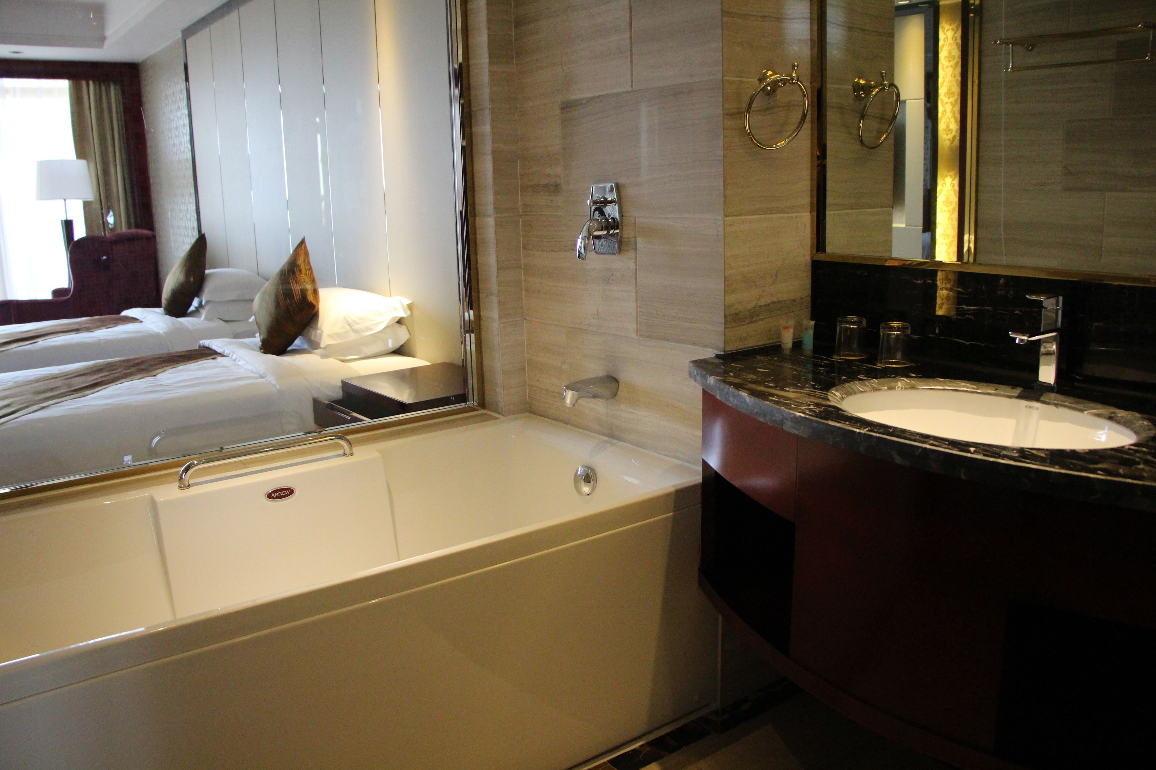 separate bathtub and shower, free toiletries, hair dryer, towels