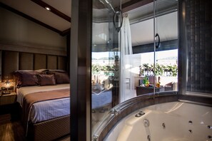 Executive suite, terras | Een minibar, een kluis op de kamer, een bureau, geluiddichte muren