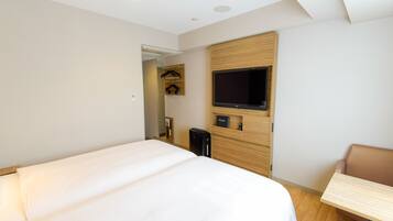 Down duvets, blackout curtains, iron/ironing board, free WiFi