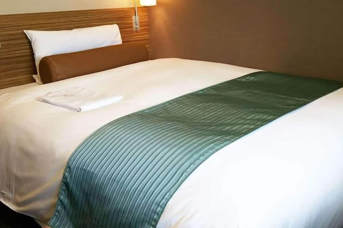 Down duvets, blackout curtains, iron/ironing board, free WiFi