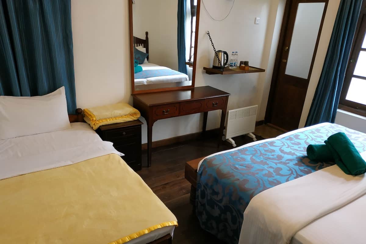 Deluxe Triple Room | Desk, soundproofing, iron/ironing board (on request), free WiFi