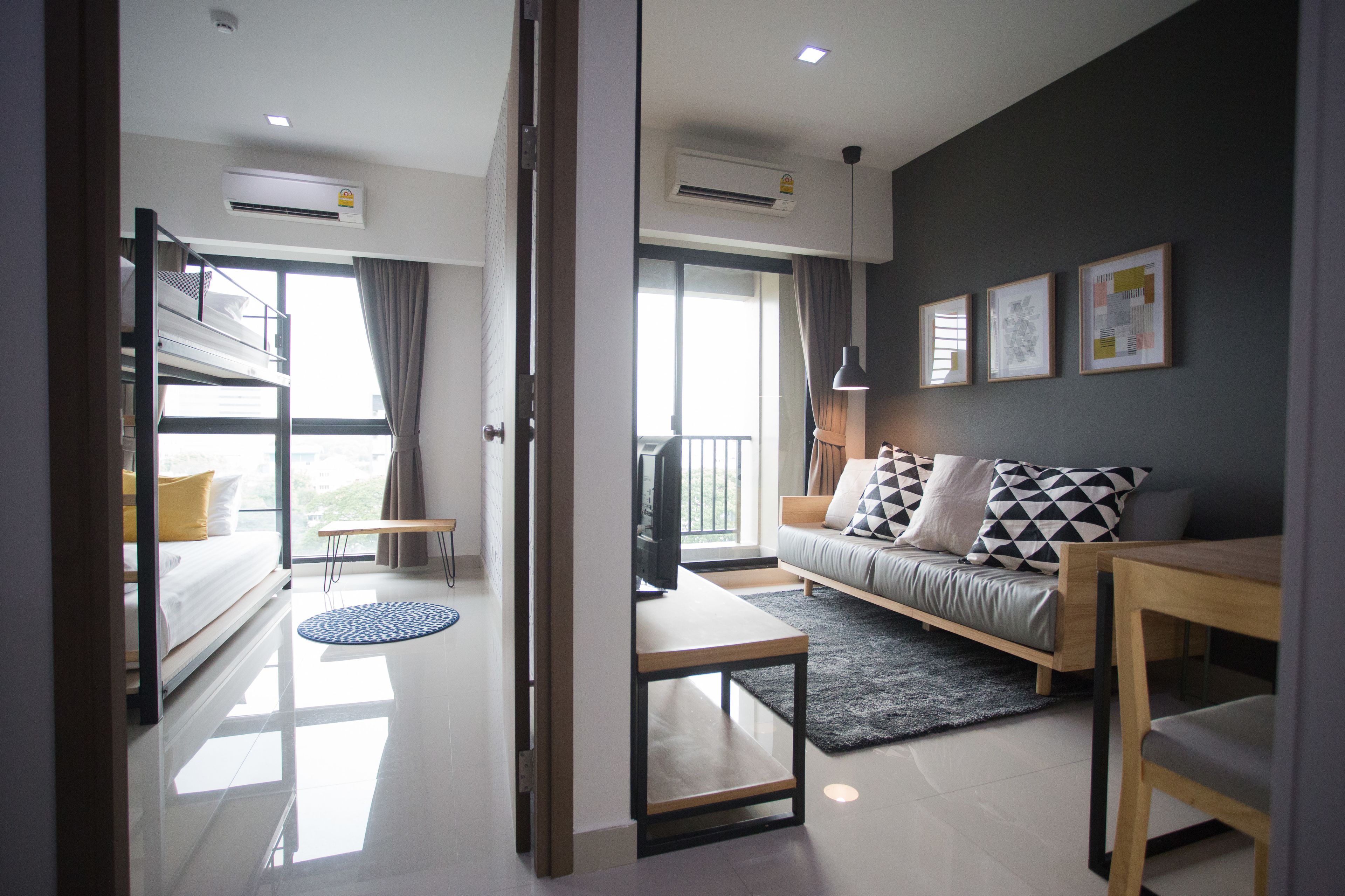deluxe suite, 2 bedrooms | living area | 32-inch flat-screen tv with digital channels, tv