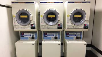 Three identical coiled dryers with control panels, labeled 'AQUA CO/N DRYER 45' and 'CO/N WASHER', each with a capacity of 5kg.