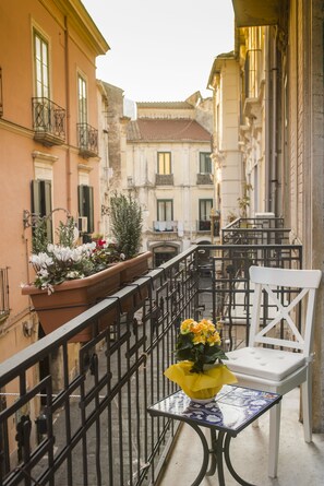 Deluxe Quadruple Room, City View | Terrace/patio