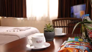 Egyptian cotton sheets, premium bedding, down duvets, minibar