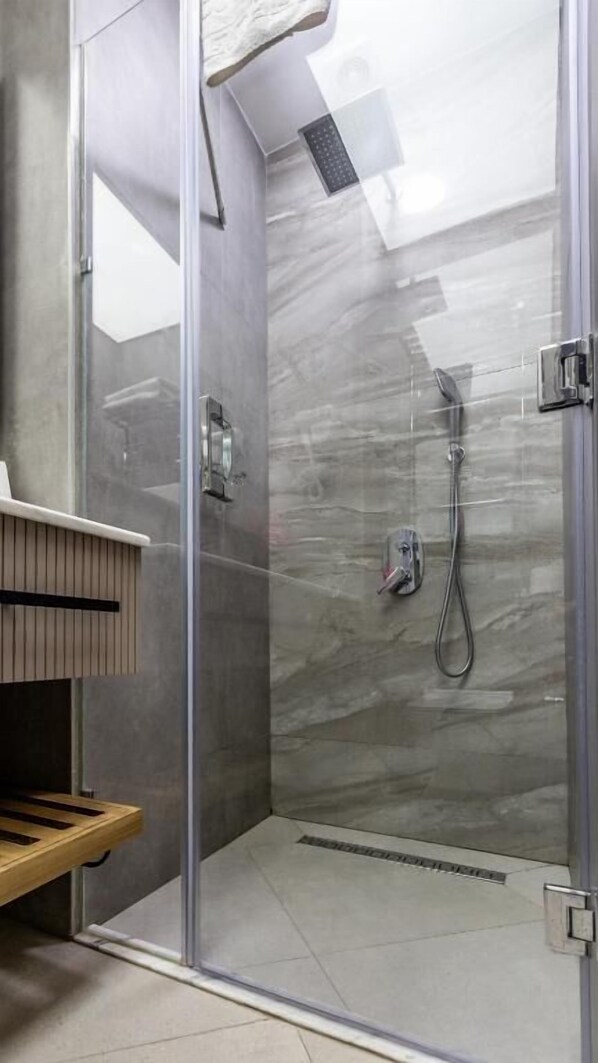 Shower, free toiletries, hair dryer, slippers