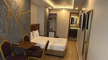 Triple Room | Premium bedding, minibar, in-room safe, desk