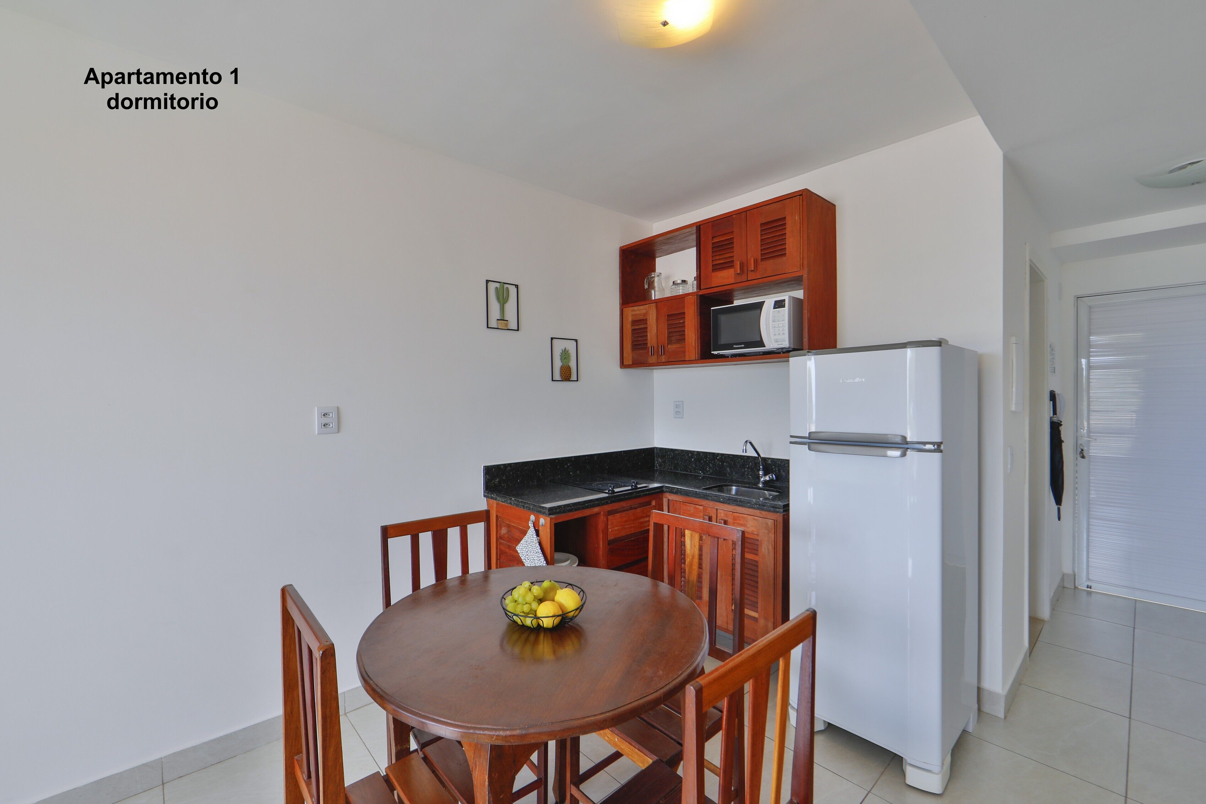 Apartamento, 1 quarto, Cozinha, Vista Parcial para o mar | Private kitchen | Full-sized fridge, microwave, stovetop, coffee/tea maker